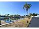 Waterfront view with private docks and lush landscaping at 10125 Manatee W Ave # D3, Bradenton, FL 34209