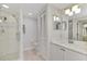 Clean bathroom with walk-in shower and single vanity at 1260 Dolphin Bay Way # 402, Sarasota, FL 34242