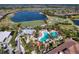 Aerial view of resort pool and clubhouse near golf course at 13031 Palermo Dr, Bradenton, FL 34211