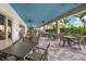 Outdoor patio with multiple tables and chairs at 15619 Sacile Ln, Lakewood Ranch, FL 34211