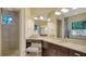Elegant bathroom with a vanity area, sleek fixtures, and glass shower at 1609 Palm View Rd, Sarasota, FL 34240