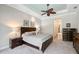 The main bedroom offers a spacious layout, complemented by elegant furnishings and soft, neutral tones at 1609 Palm View Rd, Sarasota, FL 34240