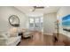 Inviting living room with hardwood floors, neutral palette and comfortable furniture at 1609 Palm View Rd, Sarasota, FL 34240