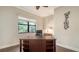Home office with a large window, desk, and comfortable chair at 1609 Palm View Rd, Sarasota, FL 34240