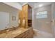 Bathroom featuring granite countertop and walk in shower at 2123 Calusa Lakes Blvd, Nokomis, FL 34275