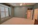Empty bedroom with carpet, a ceiling fan, window seat, and a closet at 2123 Calusa Lakes Blvd, Nokomis, FL 34275