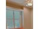 Bedroom with window and shutters at 2123 Calusa Lakes Blvd, Nokomis, FL 34275