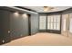 Bedroom featuring large windows, neutral carpet, and recessed lighting at 2123 Calusa Lakes Blvd, Nokomis, FL 34275