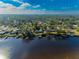 Wide aerial showcasing the property and its waterfront access at 2408 51St E Blvd, Bradenton, FL 34208