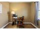 Home office with desk, chair, and window providing natural light at 2408 51St E Blvd, Bradenton, FL 34208