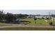 Aerial view showing a neighborhood with storm-damaged houses and empty lots at 2815 Us-41 N, Palmetto, FL 34221