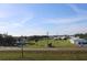 Aerial view of residential area with storm-damaged houses and open land at 2815 Us-41 N, Palmetto, FL 34221