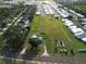 Wide aerial view of a community with mature trees, green spaces, and well-maintained homes, offering a serene environment at 2815 Us-41 N, Palmetto, FL 34221