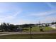 Aerial view of residential area with storm damaged houses and open green areas at 2815 Us-41 N, Palmetto, FL 34221