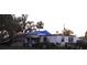 Storm damaged house with tarped roof, requiring repairs at 2815 Us-41 N, Palmetto, FL 34221