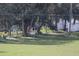 Yard with storm debris, damaged fence and trees at 2815 Us-41 N, Palmetto, FL 34221