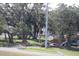 Storm damaged home with debris in the yard at 2815 Us-41 N, Palmetto, FL 34221