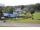 Storm damaged house requiring repairs, needs new roof and siding at 2815 Us-41 N, Palmetto, FL 34221