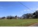 Vacant land with residential homes in the background, offering development opportunities at 2815 Us-41 N, Palmetto, FL 34221