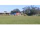 Vacant land with storm damaged house in background, near highway at 2815 Us-41 N, Palmetto, FL 34221