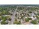 Aerial shot displaying a residential neighborhood with tree-lined streets and community layout at 2820 Wood St, Sarasota, FL 34237