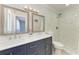 Bathroom boasts double sinks, a marble-walled shower, and sleek fixtures at 2820 Wood St, Sarasota, FL 34237