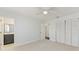 Bedroom with ensuite bathroom, closet, and neutral color scheme, providing a relaxing space at 2820 Wood St, Sarasota, FL 34237