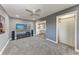 Living room boasts neutral gray walls and flows into an open concept kitchen at 2820 Wood St, Sarasota, FL 34237
