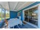 Enclosed patio with direct access to the kitchen via a sliding glass door, perfect for outdoor entertaining at 2820 Wood St, Sarasota, FL 34237