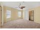 Spacious bedroom with ceiling fan and ample closet space at 3386 Oakwood N Blvd, Sarasota, FL 34237