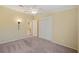 Bright bedroom with ceiling fan and spacious closet at 3386 Oakwood N Blvd, Sarasota, FL 34237