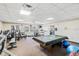 Well-equipped fitness center with cardio and weight machines at 3386 Oakwood N Blvd, Sarasota, FL 34237