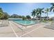 Inviting pool area with plenty of lounge chairs for sunbathing at 3386 Oakwood N Blvd, Sarasota, FL 34237