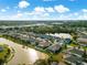 Aerial view of a single Gathering home with a pool at 4252 Wordsworth Way, Venice, FL 34293