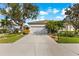 Single-Gathering home exterior with two-car garage at 4252 Wordsworth Way, Venice, FL 34293