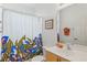 Clean bathroom with a shower/tub combo and vanity at 4311 65Th E Ter, Sarasota, FL 34243