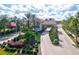 Gated community entrance with landscaping at 4311 65Th E Ter, Sarasota, FL 34243