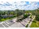 Gated community entrance with landscaping and fountain at 4311 65Th E Ter, Sarasota, FL 34243