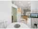 Kitchen breakfast nook with white table and chairs at 4311 65Th E Ter, Sarasota, FL 34243