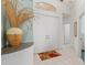 Bright and spacious entryway with tile flooring and double doors at 4311 65Th E Ter, Sarasota, FL 34243