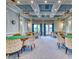 Game room with multiple tables and chairs, perfect for socializing at 4311 65Th E Ter, Sarasota, FL 34243