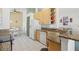 Kitchen with light wood cabinets, granite countertops, and stainless steel appliances at 4311 65Th E Ter, Sarasota, FL 34243