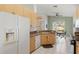 Bright kitchen with granite countertops and stainless steel appliances at 4311 65Th E Ter, Sarasota, FL 34243