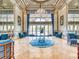 Elegant lobby with high ceilings, chandelier, and comfortable seating at 4311 65Th E Ter, Sarasota, FL 34243