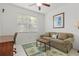 Home office features a desk, couch, and large window at 4311 65Th E Ter, Sarasota, FL 34243