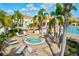 Relaxing pool and spa area with lounge chairs at 4311 65Th E Ter, Sarasota, FL 34243