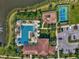 Aerial view of the community pool area, playground, and park at 4779 Pastel Ct, Sarasota, FL 34240