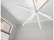 Unique modern starburst chandelier adding style to a neutrally decorated living space at 4779 Pastel Ct, Sarasota, FL 34240