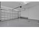 Spacious two car garage featuring epoxy flooring at 4779 Pastel Ct, Sarasota, FL 34240