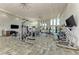 Well-equipped gym with modern machines, large windows and sleek design at 4779 Pastel Ct, Sarasota, FL 34240